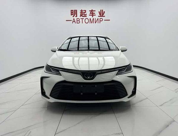 Toyota Corolla 2022 из Китая: белый седан TNGA 1.5L CVT, пробег 18 000 км, TSS 2.0, LED‑оптика, доставка и оформление под ключ с ТЛК «ЛАЗУРИТ».